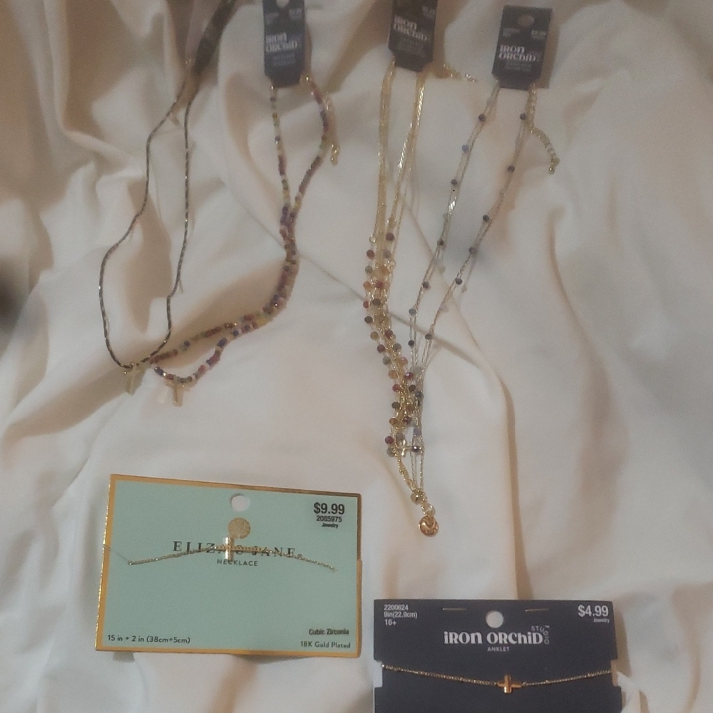 Gold Necklaces with Intricate Designs and Varying Lengths